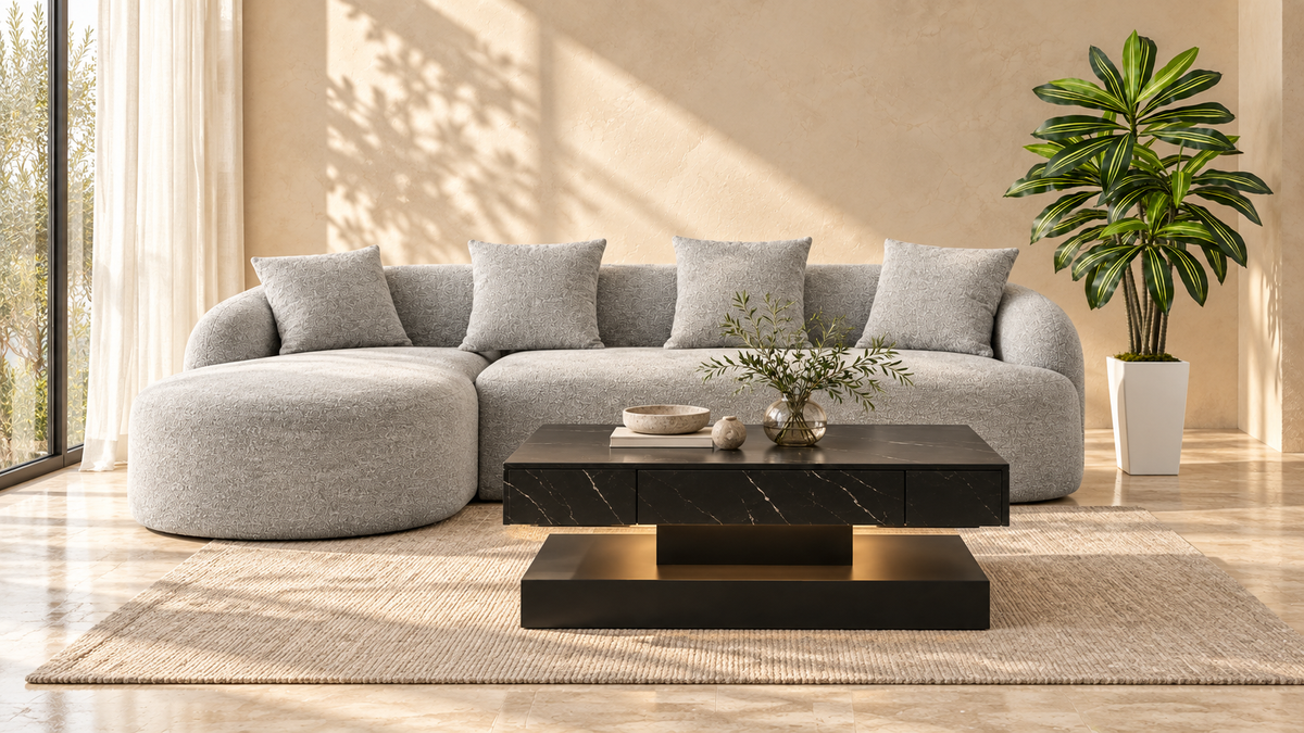 EVIM living-room styling visualization with Milo gray chenille sofa, Nova black coffee table and Dracaena faux tree