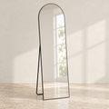 Linea black arched full-length mirror with its rear support stand open