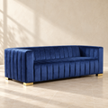 Belmont navy velvet sofa with vertical channels and gold-tone feet
