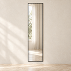 Linea rectangular full-length mirror with a dark narrow frame against a pale wall