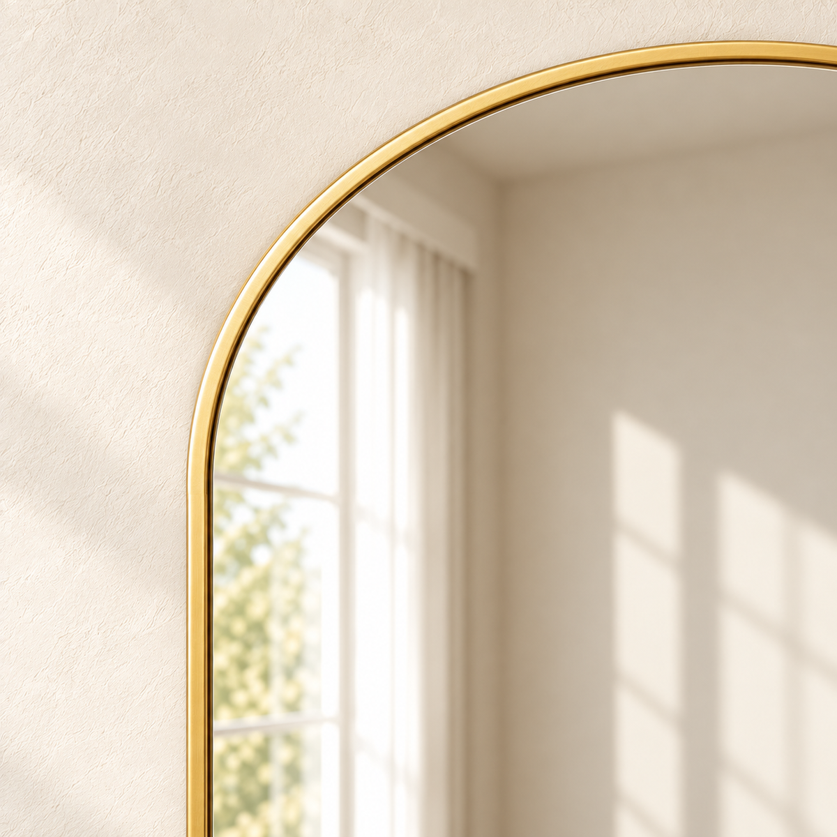 Close-up of Arc’s curved gold-tone metal frame