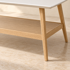 Close-up of Parker’s lower shelf and natural-finish frame
