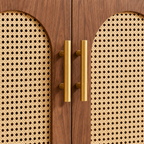 Marin paired door handles and arched woven panel detail