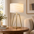 Arden table lamp with marble-pattern shade and bronze-tone open base