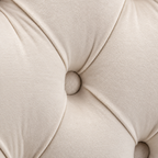 Close-up of Elara beige velvet button tufting