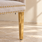 Elara double gold nailhead trim and polished gold leg detail