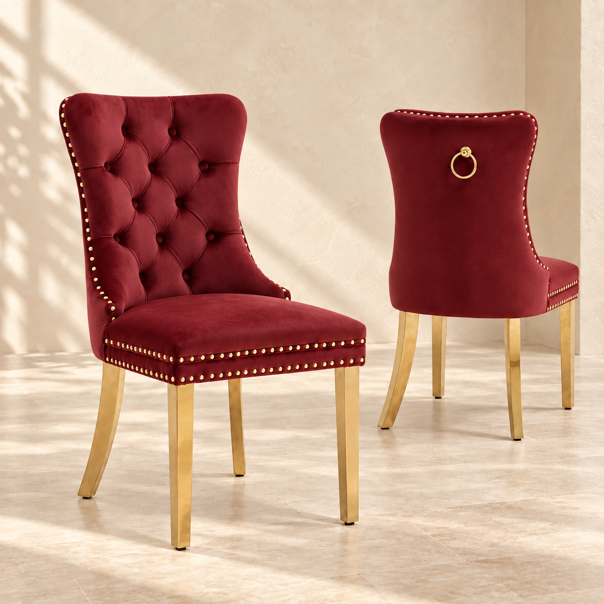 Front and rear views of Elara burgundy and gold dining chairs with decorative ring pull