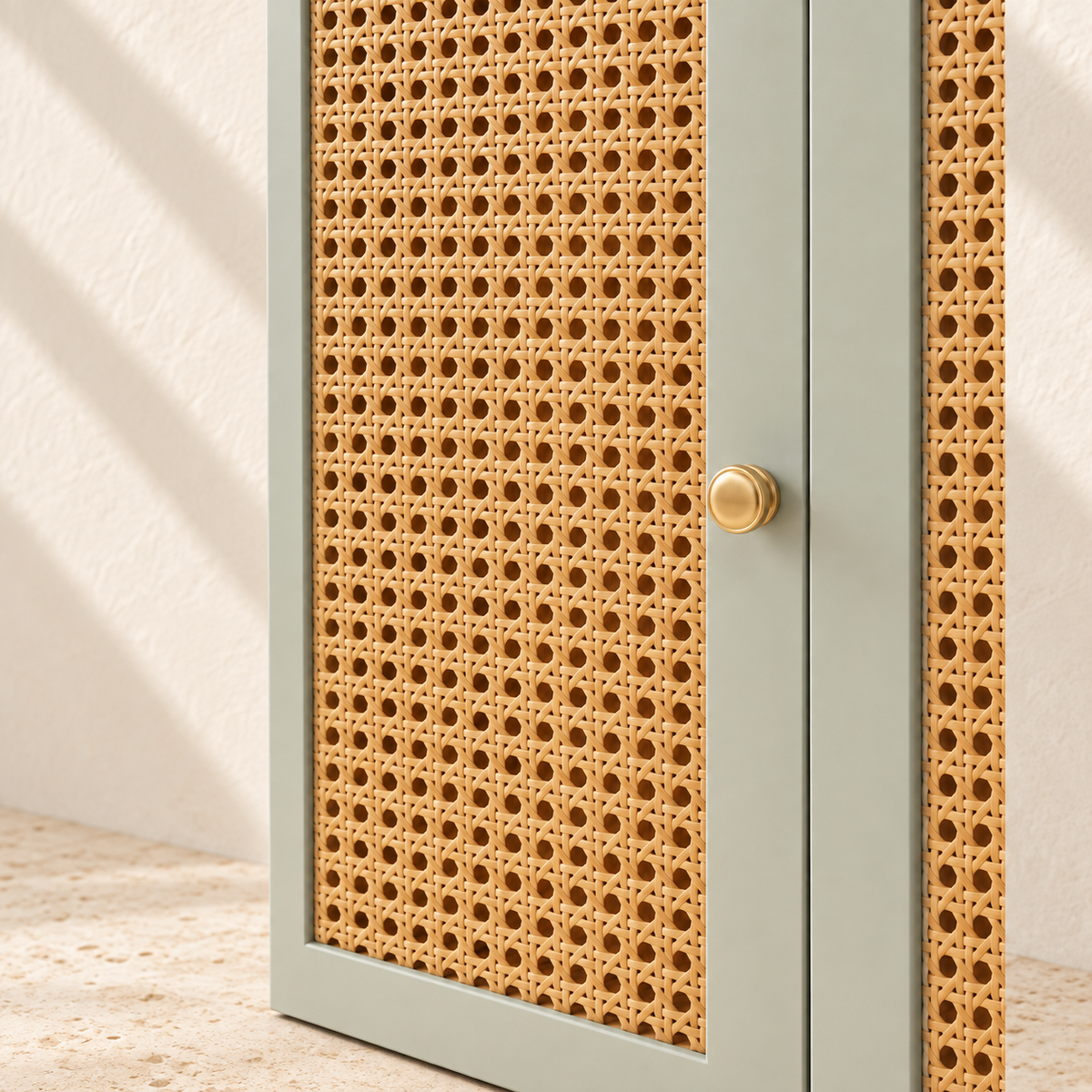 Fern natural rattan weave, pale green door frame and gold-tone knob detail