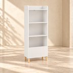 Mira four-tier white bookcase with pine legs in a warm cream interior