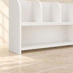 Mira bookcase wide lower shelf and side-panel foot detail
