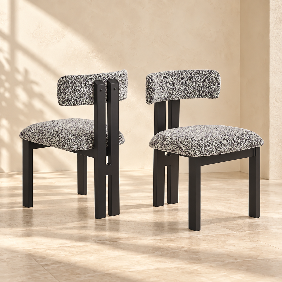 Front and rear views of Nola dining chairs with black metal legs
