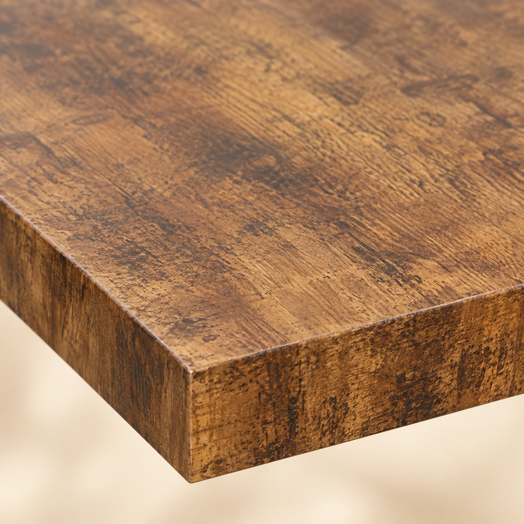 Close-up of Rhea antique brown wood-look tabletop and straight edge