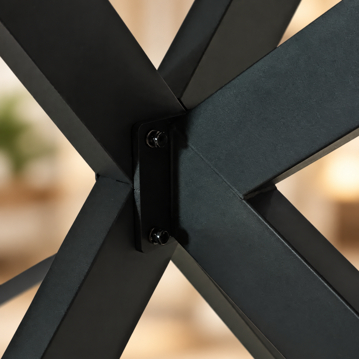 Close-up of Rhea black metal base joinery and fastening plate