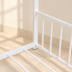 Detail of the Willa bed’s white metal end rail and slat connections
